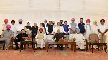 Chandigarh: Punjab's new Chief Minister Charanjit Singh Channi with his Cabinet after the oath-taking ceremony in Chandigarh