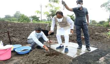Madhya Pradesh: CM Shivraj Singh Chouhan seen watering sapling in rain; Twitterati say ‘Andaz Apna Apna’