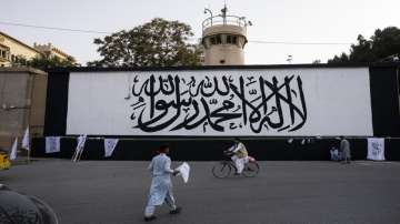 Taliban flag, seat of power, fateful 911 anniversary, Quranic verse, Mullah Mohd Hassan Akhund, Tali