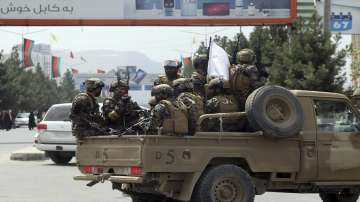 Taliban special force fighters arrive inside the Hamid Karzai International Airport after the U.S. military's withdrawal, in Kabul, Afghanistan