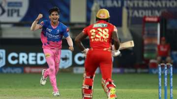 Kartik Tyagi of Rajasthan Royals celebrates the wicket of Fabian Allen of Punjab Kings in the final over to win the game during match 32