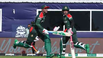 Bangladesh's Shakib Al Hasan and  Mushfiqur Rahim run between the wickets during the T20 World Cup m