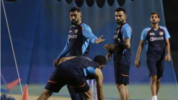 Team India mentor MS Dhoni along with skipper Virat Kohli during a practice session ahead of India's