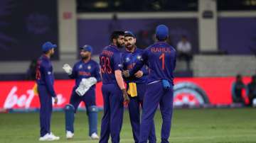India skipper Virat Kohli in conversation with Jasprit Bumrah and KL Rahul during their clash agains