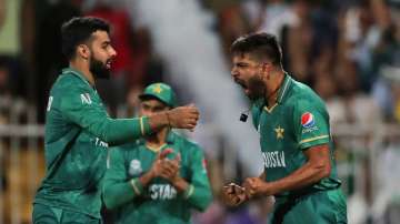 Pakistan's Haris Rauf celebrates the dismissal of New Zealand's Martin Guptill during the Cricket Tw