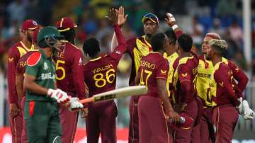 West Indies players celebrate the dismissal of Bangladesh's Liton Das during the Cricket Twenty20 Wo