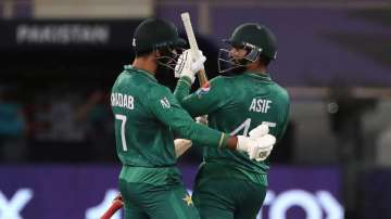 Pakistan's Asif Ali, right, celebrates with batting partner Shadab Khan after their win in the Crick