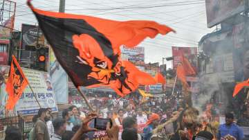 Bajrang Dal members stage a protest against the recent killings of Hindus and vandalism of a Durga idol by miscreants in Bangladesh, at Krishnanagar in Nadia, on Monday.