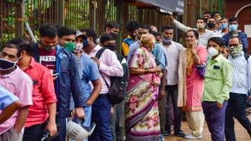 Beneficiaries wait in a queue to receive Covid-19 vaccine dose, at a vaccination centre in Mumbai. (Representational image)