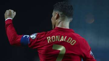 Cristiano Ronaldo of Portugal celebrates scoring Portugal's fifth goal and his third in the match du