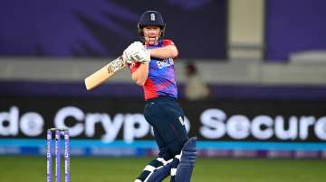 Eoin Morgan of England hits runs during the ICC Men's T20 World Cup match between England and West I