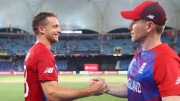 Jos Buttler and Eoin Morgan of England celebrate following the ICC Men's T20 World Cup match.