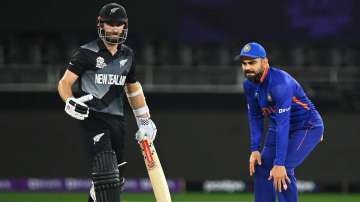Kane Williamson of New Zealand interacts with Virat Kohli of India during the ICC Men's T20 World Cu
