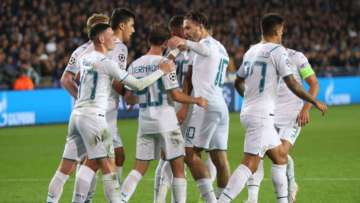 Riyad Mahrez of Manchester City (obscured) celebrates after scoring their side's second goal with Phil Foden, Bernardo Silva and Jack Grealish during the UEFA Champions League group A match between Club Brugge KV and Manchester City at Jan Breydel Stadium on October 19, 2021 in Brugge, Belgium. 