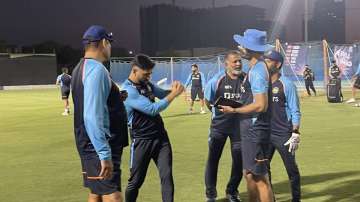 MS Dhoni (second from left) with Team India coaching staff on Sunday.