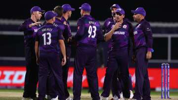 Scotland players celebrate after taking a Bangladesh wicket in Al Amerat (Oman) on Sunday.