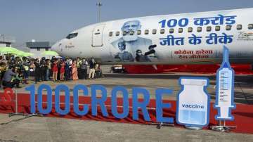 SpiceJet Airlines cover the outer part of their entire aircraft fleet with images of Prime Minister Narendra Modi and healthcare workers, as India crossed the 1 billion Covid-19 vaccine dose milestone, at IGI Airport in New Delhi