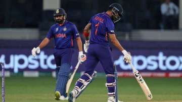 India's KL Rahul, right, reacts after hitting a boundary during the Cricket Twenty20 World Cup match between India and Scotland in Dubai, UAE, Friday, Nov. 5, 2021.?