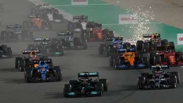 Mercedes driver Lewis Hamilton of Britain leads at the start of the Qatar Formula One Grand Prix. In