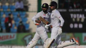 India's Shreyas Iyer (right) and Ravindra Jadeja take a single during day one of their first Test ma