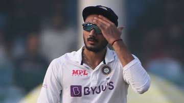 India's Axar Patel walks after finishing an over during the day three of their first test cricket ma