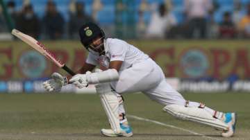 India's Wriddhiman Saha plays a shot during the day four of their first test cricket match with New 