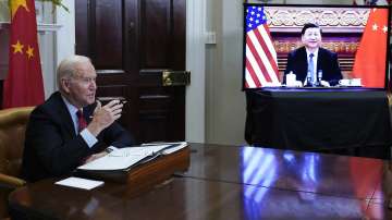 Joe Biden meets virtually with Xi Jinping from the Roosevelt Room of the White House in Washington on Nov 15.