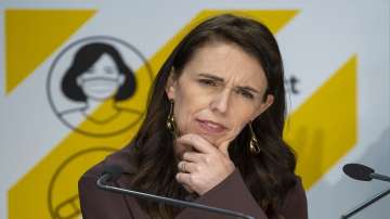 New Zealand Prime Minister Jacinda Ardern gestures during a post-Cabinet press conference at Parliament in Wellington.