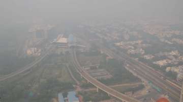 Low visibility due to a thick layer of smog post Diwali celebrations in Noida on Saturday (Nov 6).