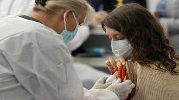 A woman from Russia is administered a dose of COVID-19 vaccine in Zagreb, Croatia.