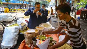 Paytm CEO Vijay Shekhar Sharma has street food from a roadside stall after the listing ceremony of Paytm at BSE in Mumbai.