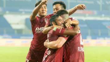 NorthEast United FC players celebrating goal against SC East Bengal in ISL 2021-22. 