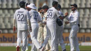 India's cricketers celebrate after winning on the day four of their second test cricket match with N