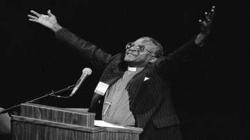 South African Bishop Desmond Tutu gestures during remarks denouncing his country's apartheid policy of racial separation in New Orleans, Sept. 7, 1982. Tutu, South Africa's Nobel Peace Prize-winning activist for racial justice and LGBT rights and retired Anglican Archbishop of Cape Town, has died, South African President Cyril Ramaphosa announced Sunday Dec. 26, 2021. He was 90.