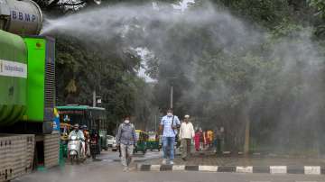 A BBMP vehicle sprays disinfectant in front of Vidhana Soudha in view of possible spread of Covid-19 variant Omicron in Bengaluru, Tuesday, Dec 7, 2021.