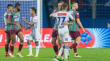 ATK and Chennaiyin FC players shacking hands after the match in ISL.