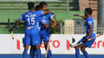 Indian hockey team celebrating after scoring a goal against Pakistan in the Men's Asian Champions Tr