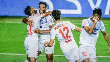 Chennaiyin FC players celebrating after scoring a goal