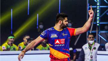 Pradeep Narwal celebrating after clamming a point against Patna Pirates in PKL 2021. 