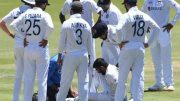 Indian players gather around Jasprit Bumrah when the physios came to check Bumrah's ankle sprain  