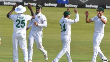 South Africa team celebrates after taking the wicket of Indian batsman in the first Test.?