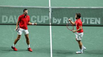 Mate Pavic (L) and Nikola Mektic of Croatia celebrate during their during the Davis Cup semi final b