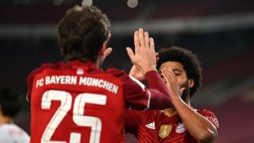 Serge Gnabry of FC Bayern Muenchen celebrates after scoring a goal during a match