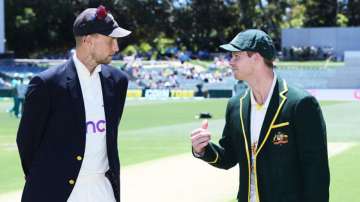 Australia stand-in captain Steve Smith (right) with England captain Joe Root during the coin toss of