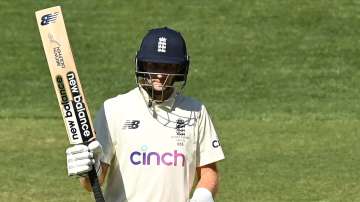 England's captain Joe Root raises his bat after scoring a half-century on Day 3 of 2nd Test in Adela