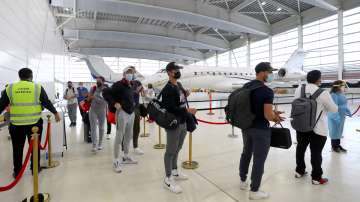 Tennis players arrive on a chartered flight ahead of the 2022 tennis season leading into the 2022 Au