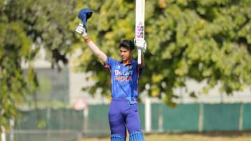 India U19 opener Harnoor Singh raises his bat after scoring a century against UAE U19 in Dubai on Th