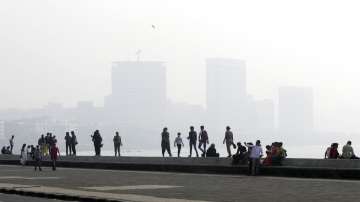 Skyline is seen as people spend time at Marine Drive in Mumbai. Delhi and Mumbai reported a surge in daily Covid cases.