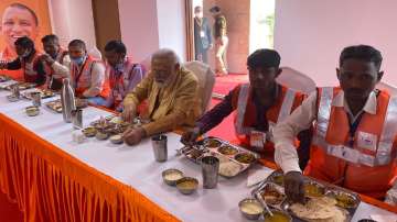 Having lunch, showering flower petals: How PM honoured project's construction workers | WATCH