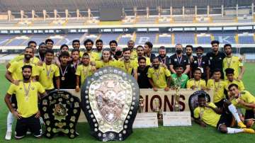 Real Kashmir players and staff memebers pose with the IFA Shield title in VBKY Stadium (Salt Lake) i